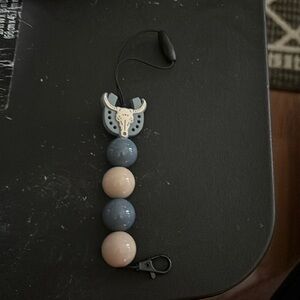 A car freshener holder